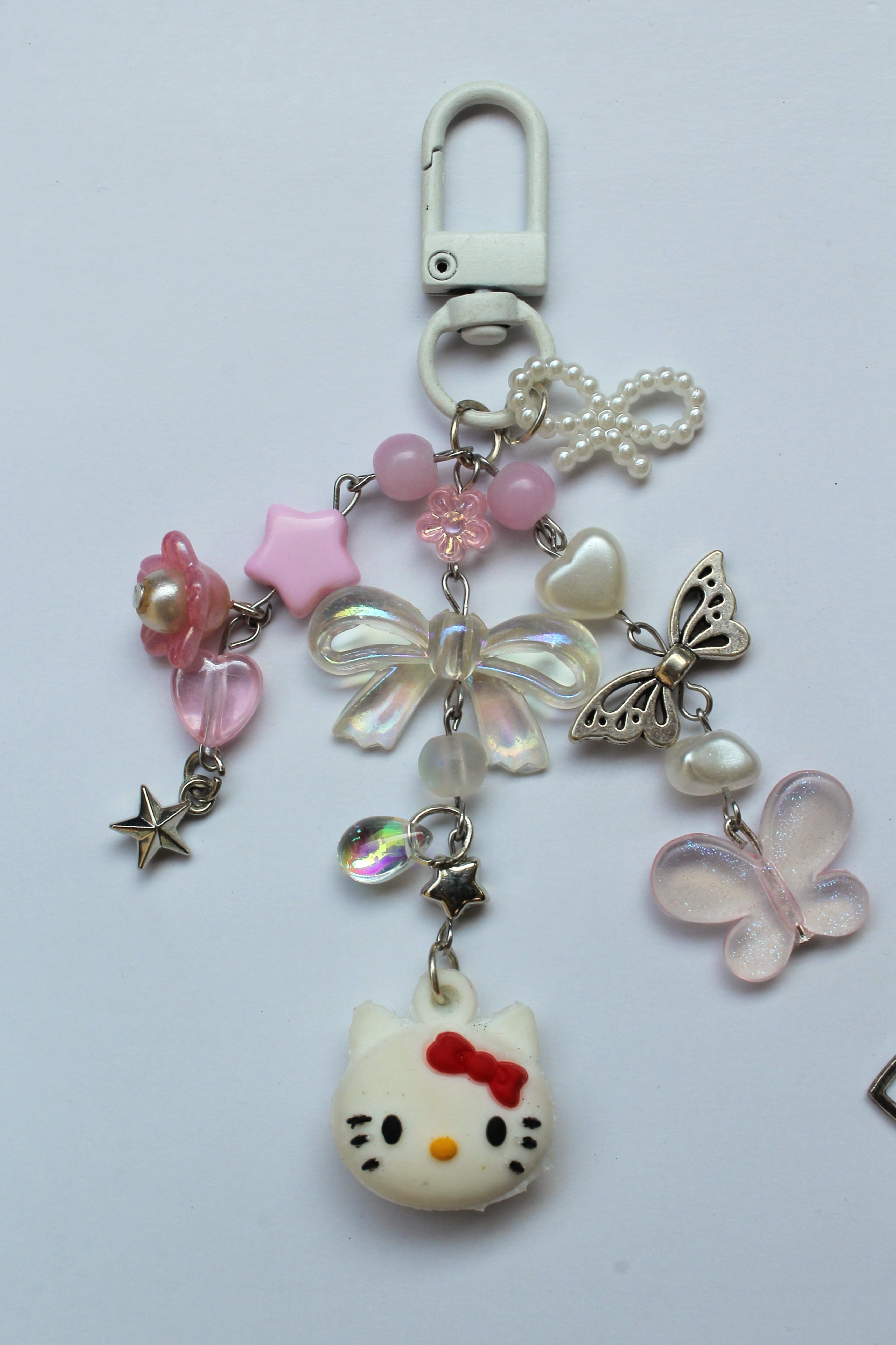 Kitty X Spidey Keychains